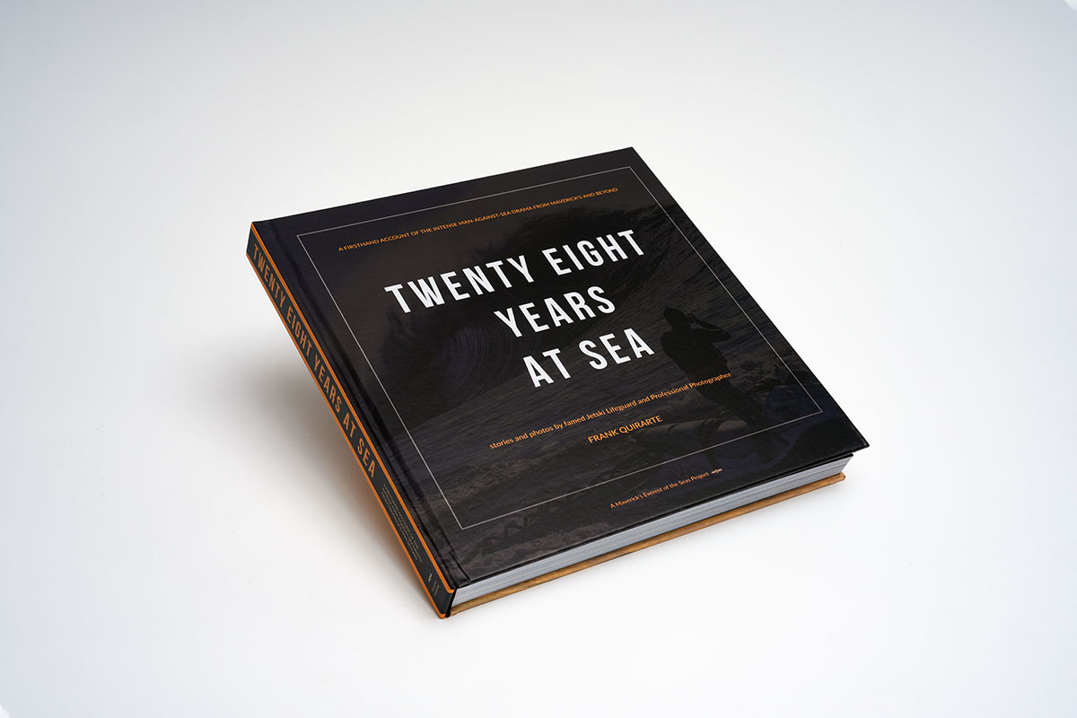 Hardcover photography coffee table book with matte lamination showcasing vibrant big-wave surfing images