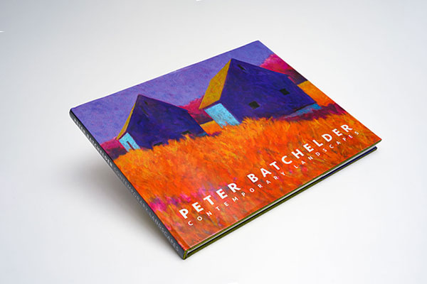 Hardcover coffee table art book with fabric cloth cover and foil stamping showcasing vibrant contemporary landscape oil paintings