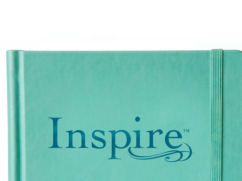 Turquoise hardcover notebook with an elastic closure band