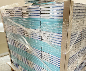 Hardcover books packed on a pallet before shipment
