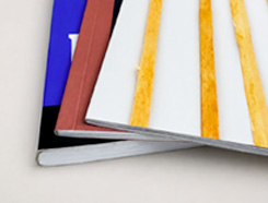 Perfect bound softcover book sample with layered pages and cover