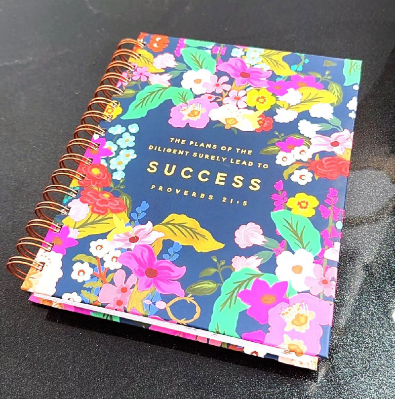 Coil-bound notebook with a hardcover