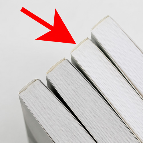 Close-up of perfect bound softcover book pages at the spine